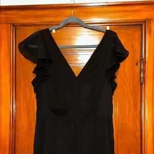 Large black LuLus jumpsuit with ruffle sleeves
